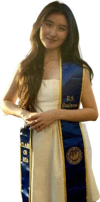Quynh Tran in a graduation gown and Class of 2024 stole